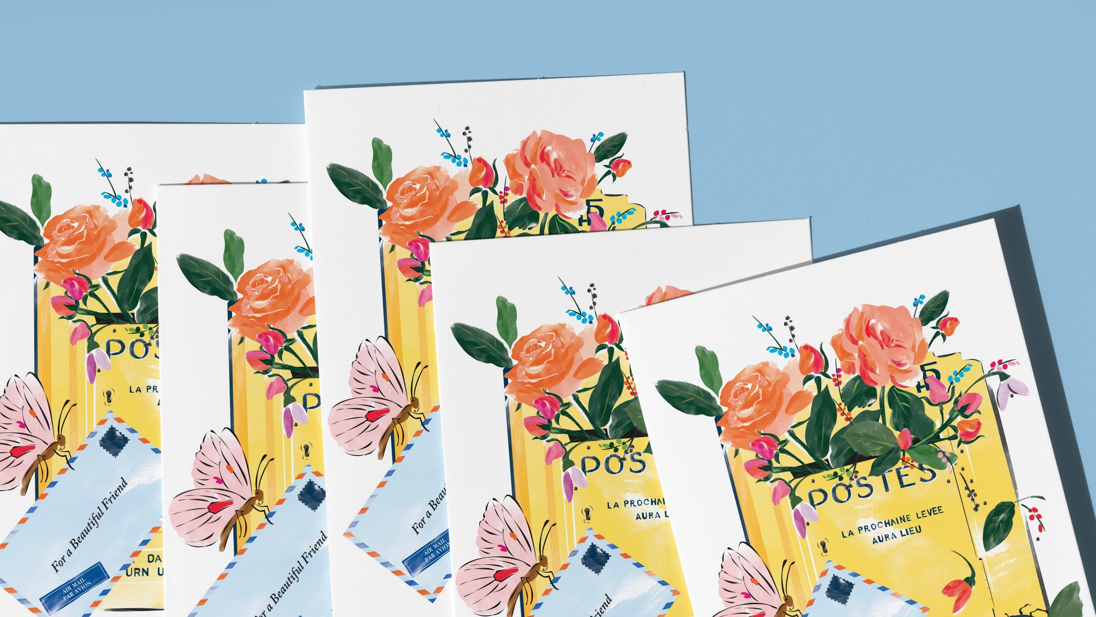 Set of floral greeting cards on a blue background